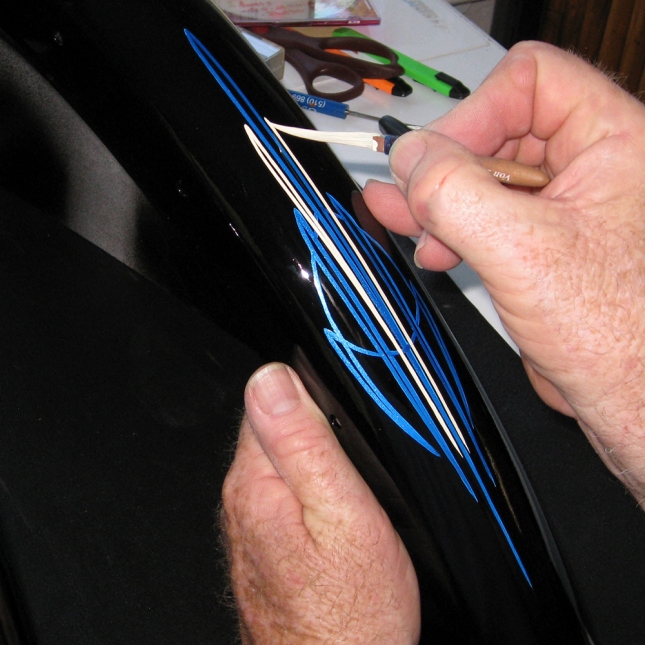 For my fine line art pinstriping which is shown in the first picture I 